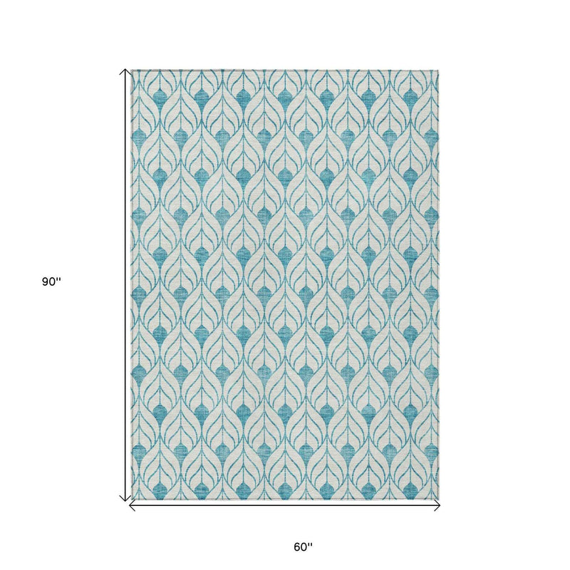 5' X 8' Teal Blue And Ivory Geometric Washable Indoor Outdoor Area Rug