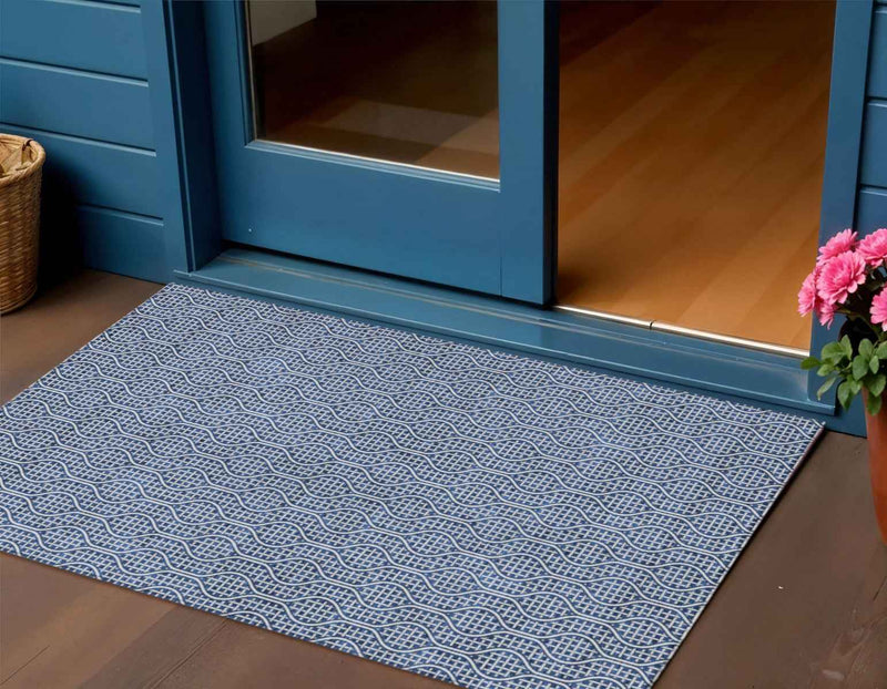 3' X 5' Navy Blue And Ivory Geometric Washable Indoor Outdoor Area Rug