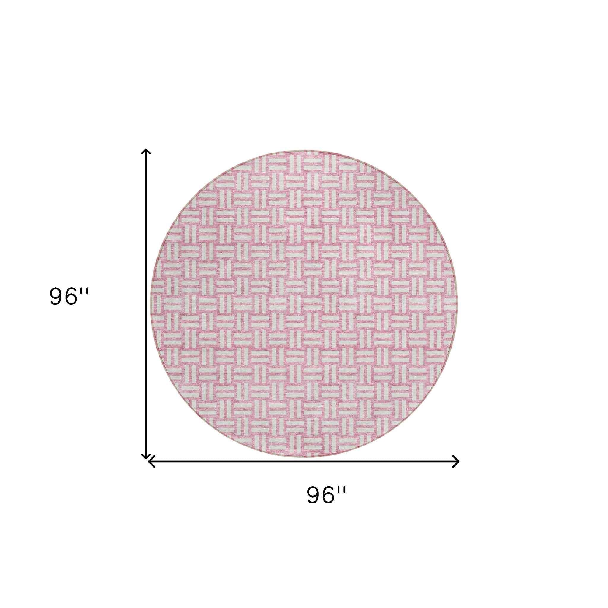 8' Pink And Ivory Round Geometric Washable Indoor Outdoor Area Rug
