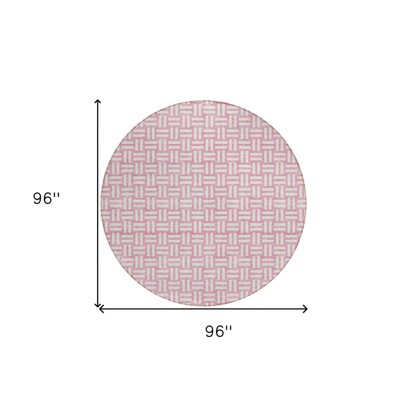 8' Pink And Ivory Round Geometric Washable Indoor Outdoor Area Rug