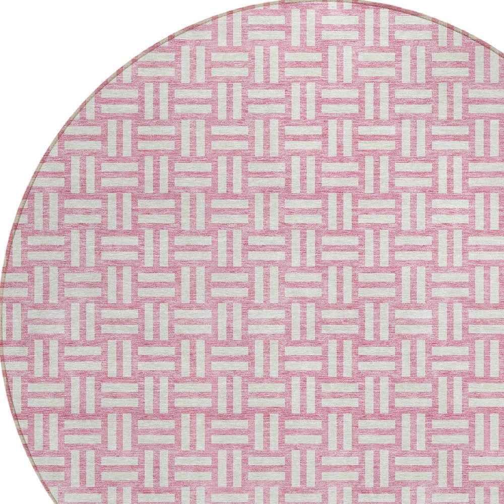 8' Pink And Ivory Round Geometric Washable Indoor Outdoor Area Rug