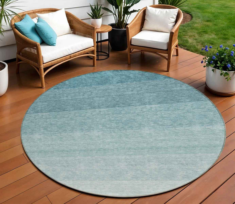 8' Teal Blue And Ivory Round Ombre Washable Indoor Outdoor Area Rug