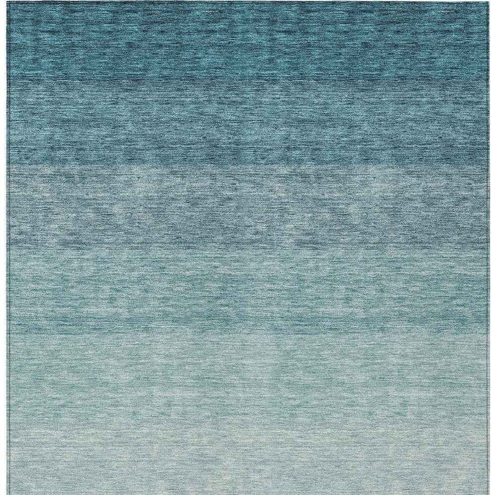 5' X 8' Teal Blue And Ivory Ombre Washable Indoor Outdoor Area Rug