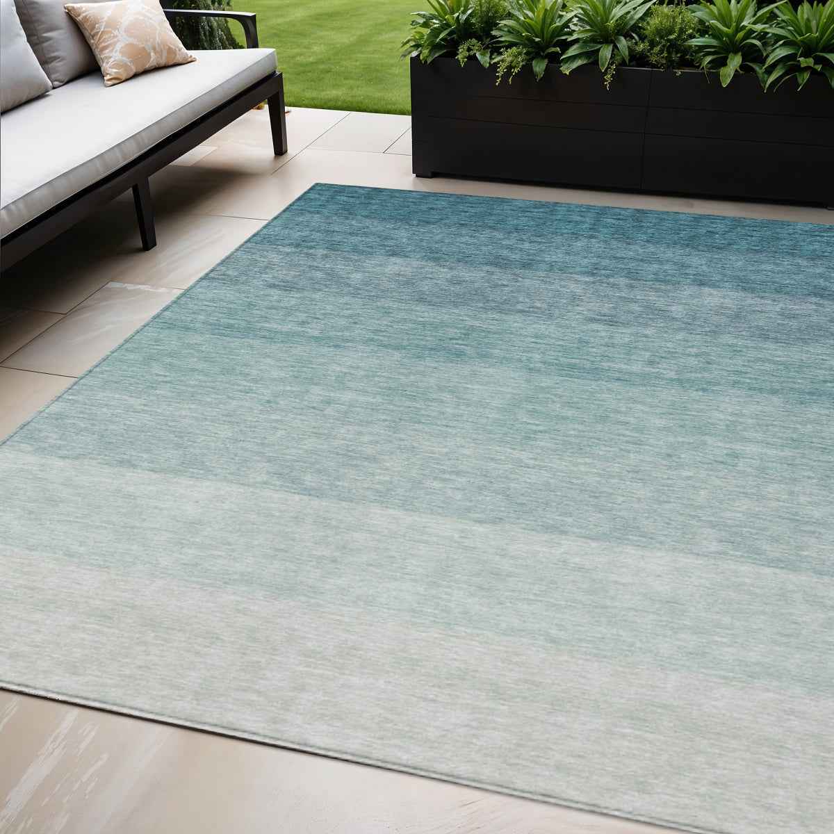 5' X 8' Teal Blue And Ivory Ombre Washable Indoor Outdoor Area Rug