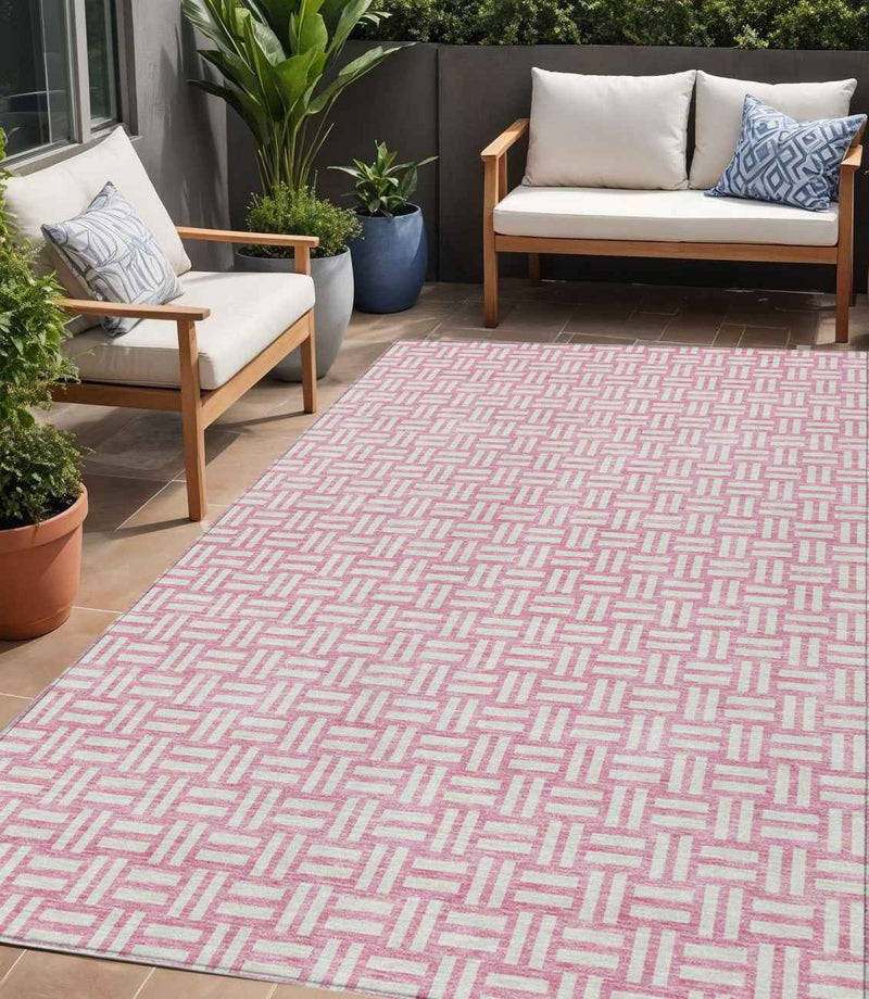 5' X 8' Pink And Ivory Geometric Washable Indoor Outdoor Area Rug