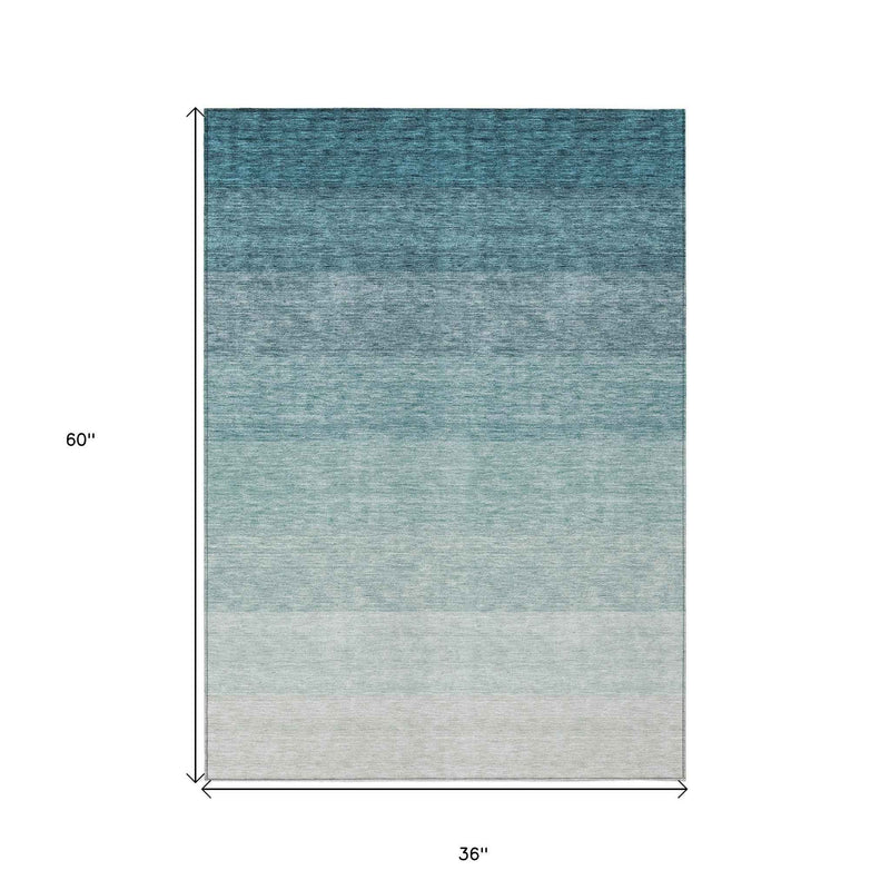 3' X 5' Teal Blue And Ivory Ombre Washable Indoor Outdoor Area Rug