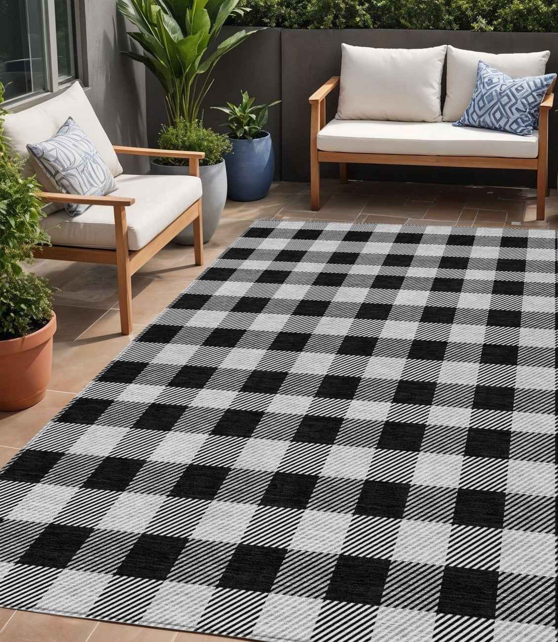 5' X 8' Black Gray And Ivory Plaid Washable Indoor Outdoor Area Rug