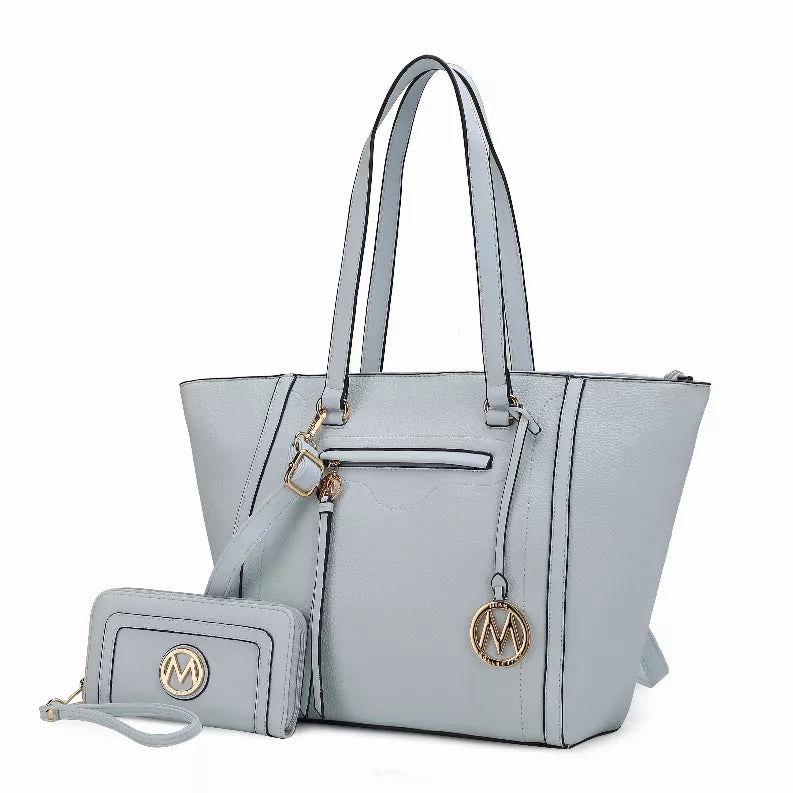Light gray vegan leather tote bag with top handles and matching wrist wallet