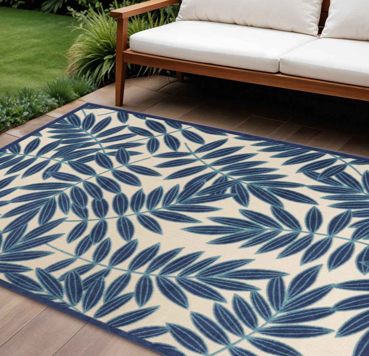 8' Blue And Ivory Round Floral Indoor Outdoor Area Rug