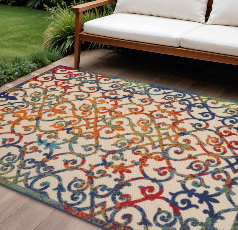 6' X 9' Ivory And Blue Indoor Outdoor Area Rug