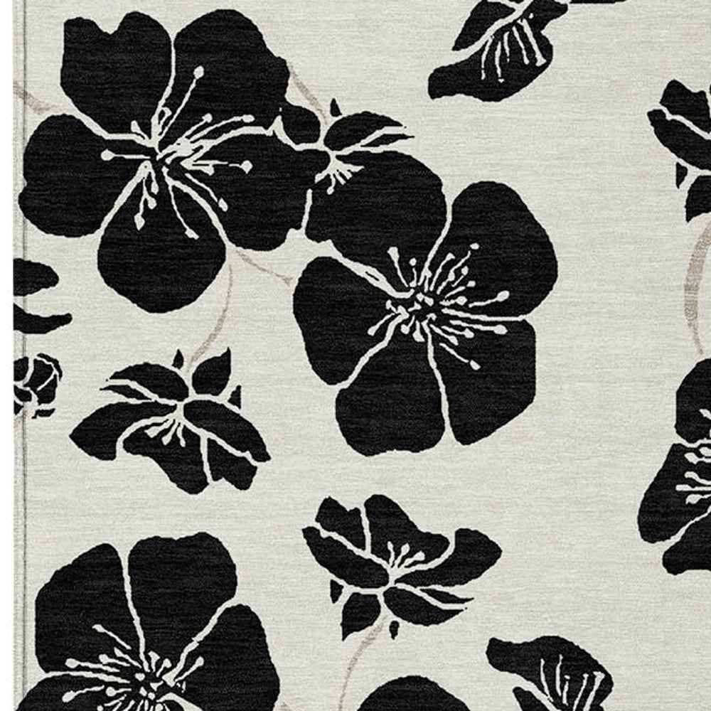 9' X 12' Ivory And Black Floral Washable Indoor Outdoor Area Rug