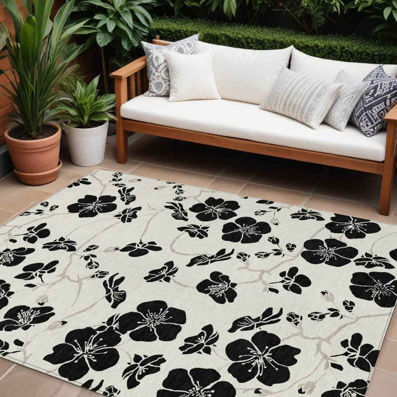 8' X 10' Ivory And Black Floral Washable Indoor Outdoor Area Rug