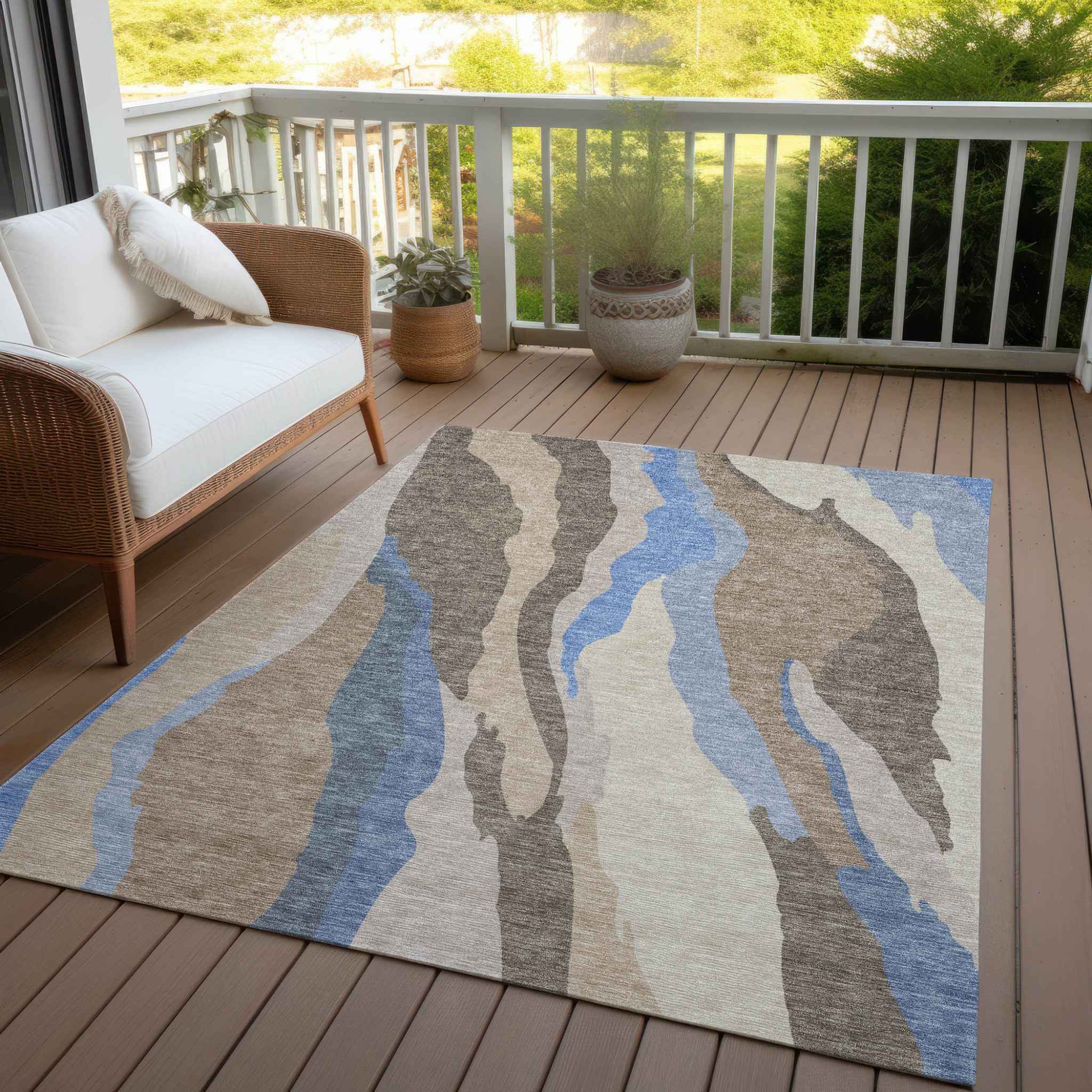 5' X 8' Taupe Tan And Blue Abstract Washable Indoor Outdoor Area Rug