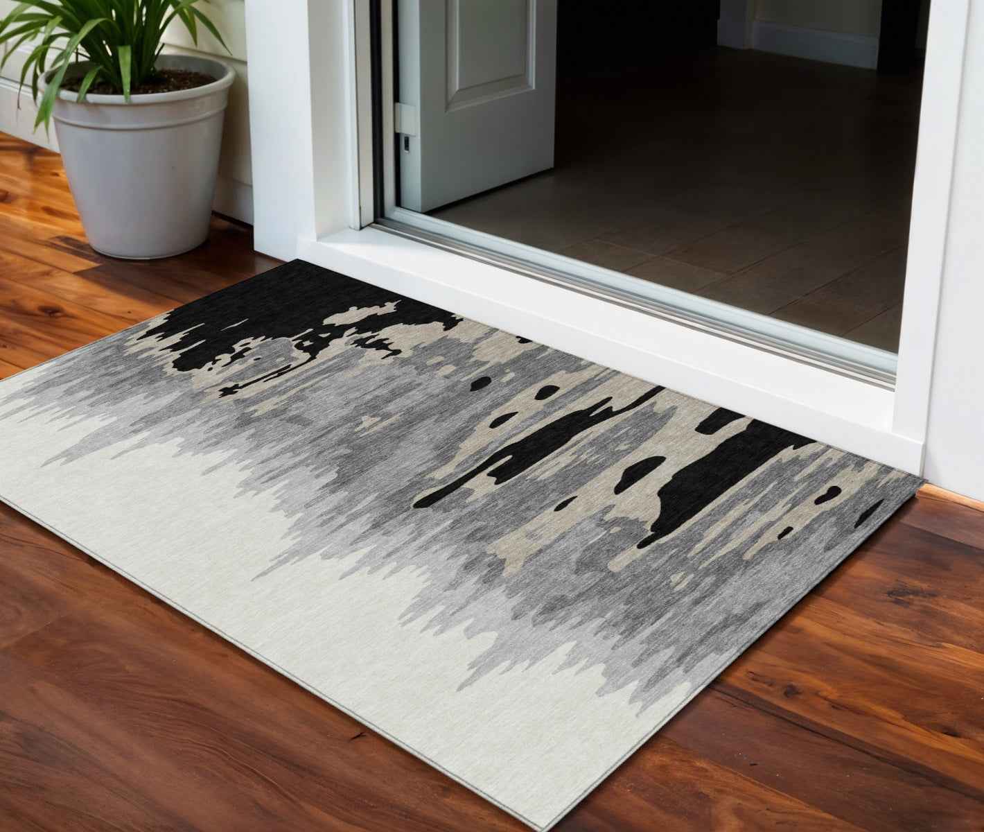 3' X 5' Black Gray And Ivory Abstract Washable Indoor Outdoor Area Rug