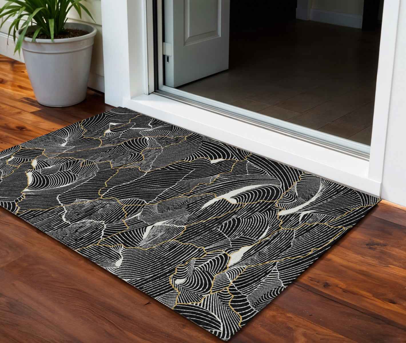 3' X 5' Black Ivory And Gold Abstract Washable Indoor Outdoor Area Rug