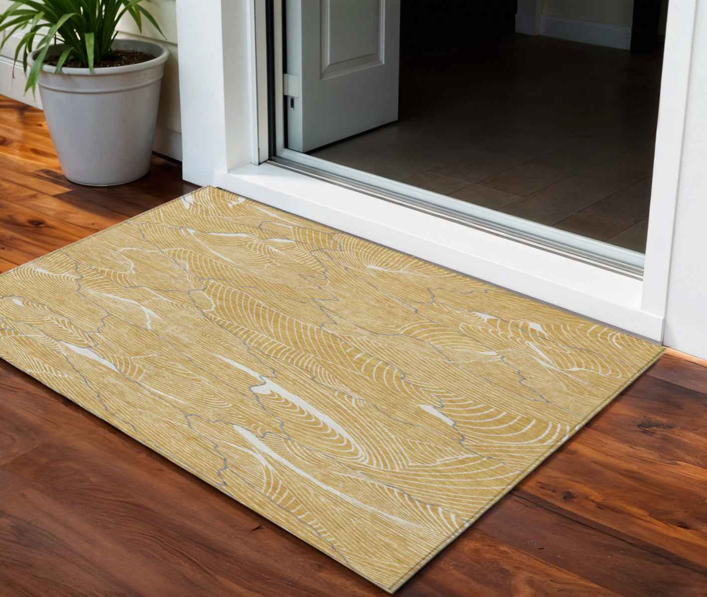 3' X 5' Gold Charcoal And Ivory Abstract Washable Indoor Outdoor Area Rug