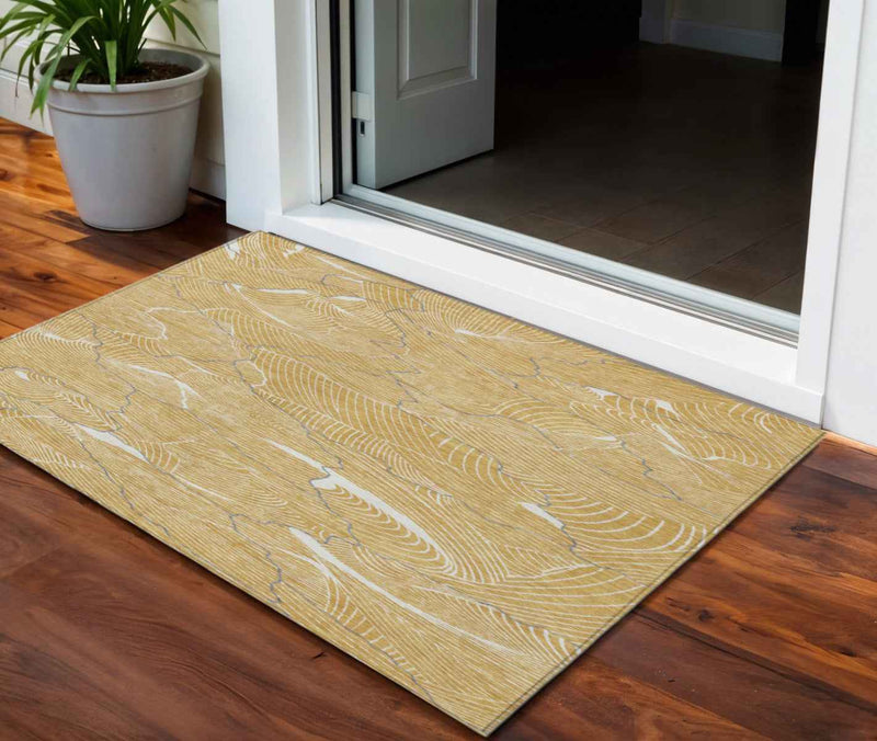 3' X 5' Gold Charcoal And Ivory Abstract Washable Indoor Outdoor Area Rug