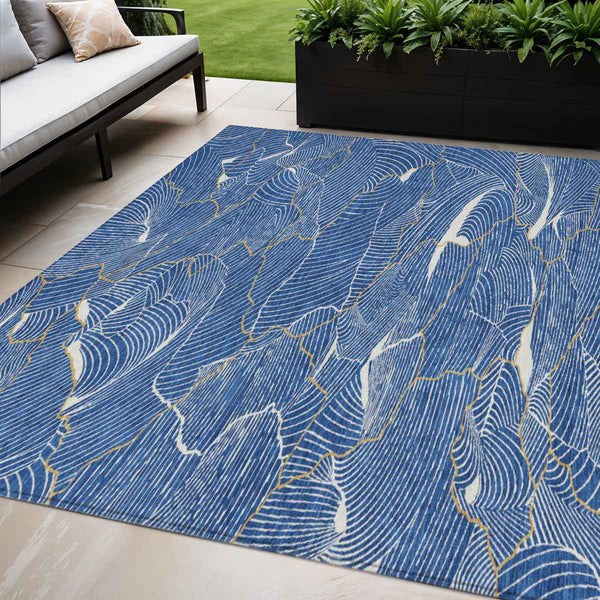 5' X 8' Blue Ivory And Gold Abstract Washable Indoor Outdoor Area Rug