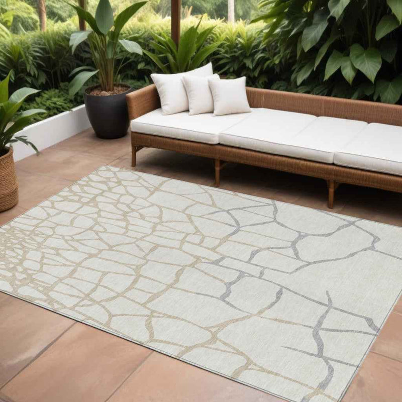 8' X 10' Ivory And Beige Abstract Washable Indoor Outdoor Area Rug