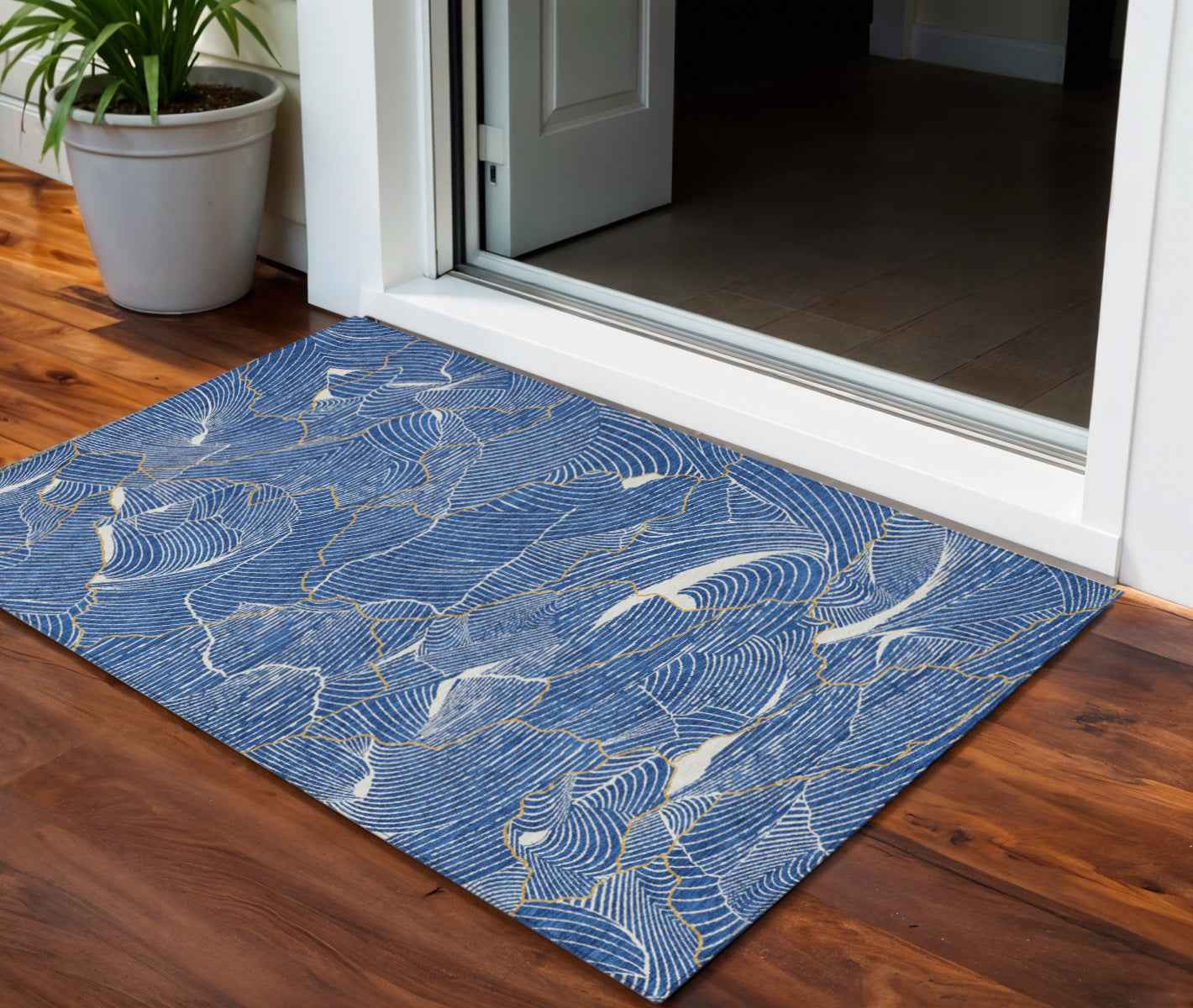 3' X 5' Blue Ivory And Gold Abstract Washable Indoor Outdoor Area Rug