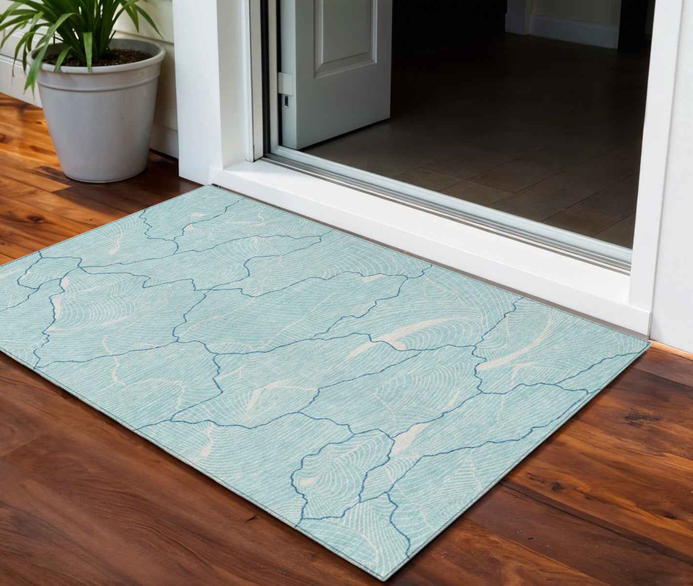 3' X 5' Aqua And Ivory Abstract Washable Indoor Outdoor Area Rug