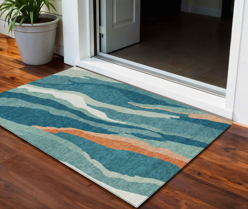 3' X 5' Teal Blue Copper And Ivory Abstract Washable Indoor Outdoor Area Rug