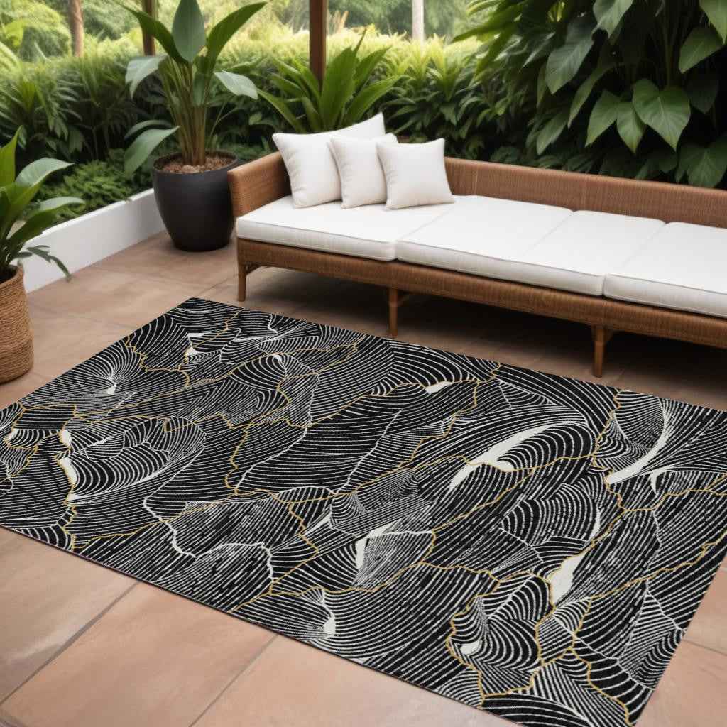 8' X 10' Black Ivory And Gold Abstract Washable Indoor Outdoor Area Rug