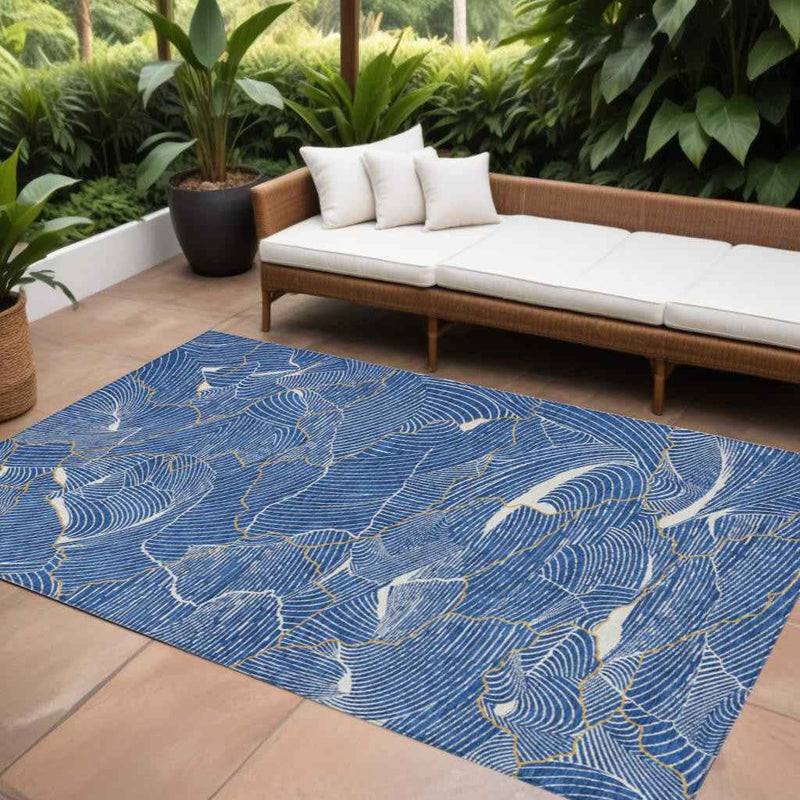 8' X 10' Blue Ivory And Gold Abstract Washable Indoor Outdoor Area Rug