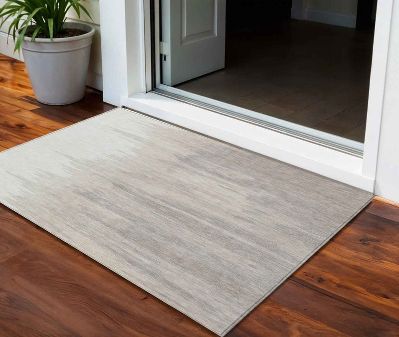 3' X 5' Ivory And Brown Abstract Washable Indoor Outdoor Area Rug