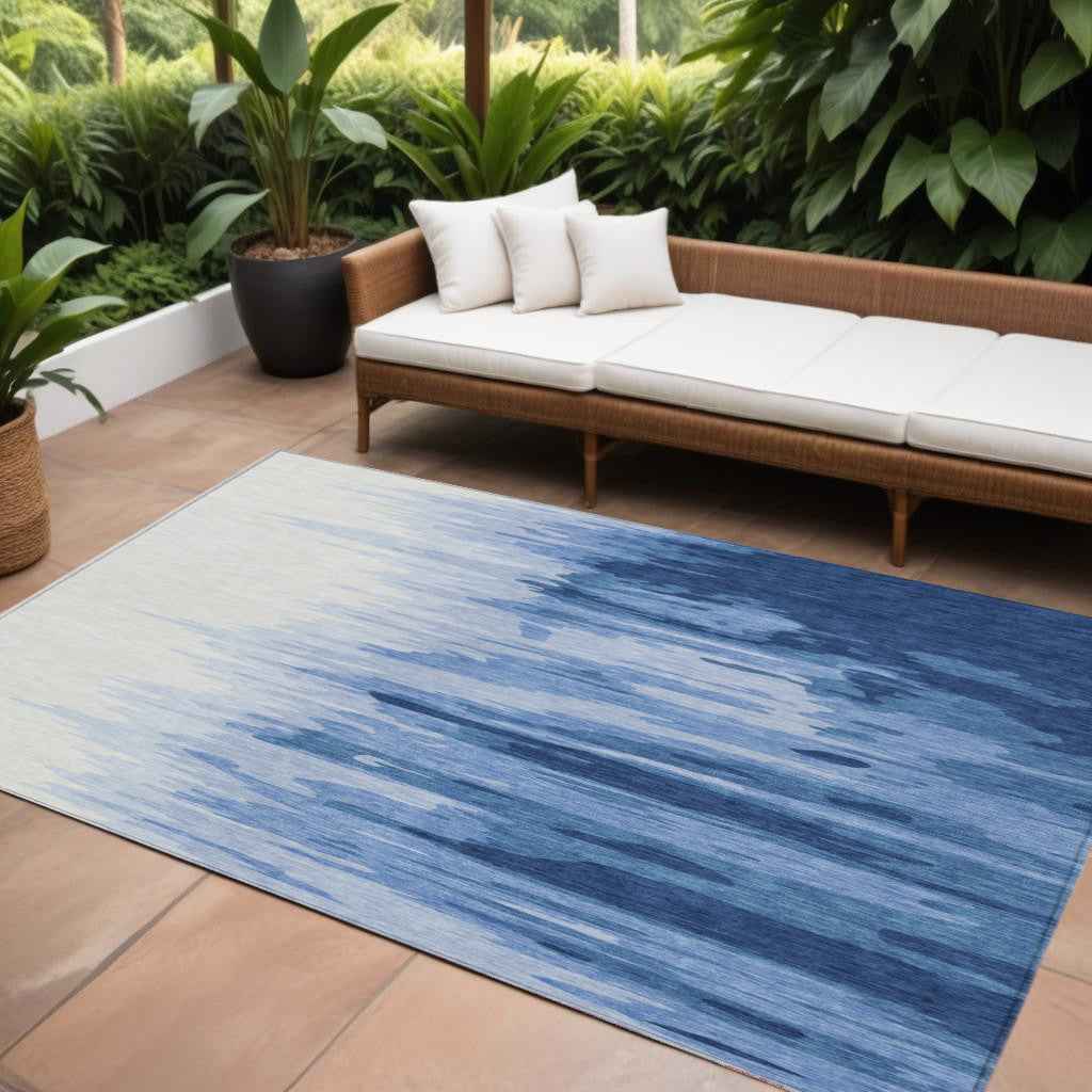 9' X 12' Navy Blue And Ivory Abstract Washable Indoor Outdoor Area Rug