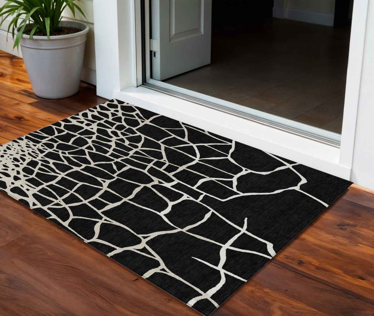 3' X 5' Black And Beige Abstract Washable Indoor Outdoor Area Rug
