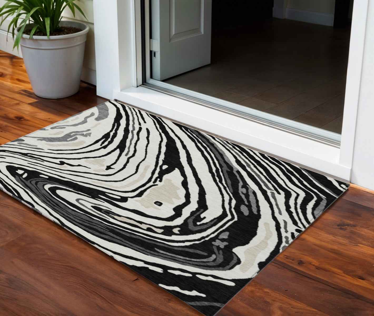 3' X 5' Black Gray And Ivory Abstract Washable Indoor Outdoor Area Rug