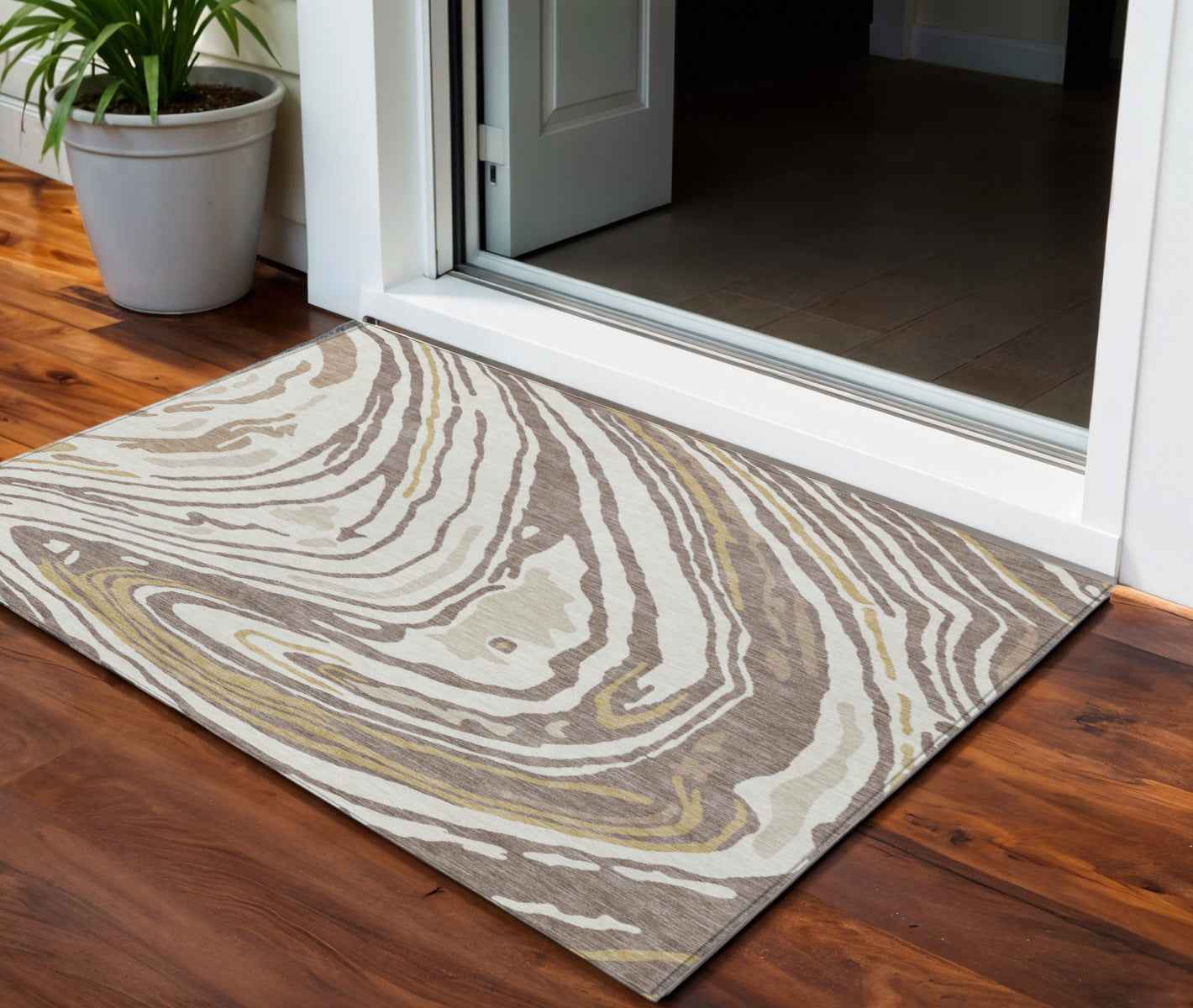 3' X 5' Taupe Brown And Beige Abstract Washable Indoor Outdoor Area Rug