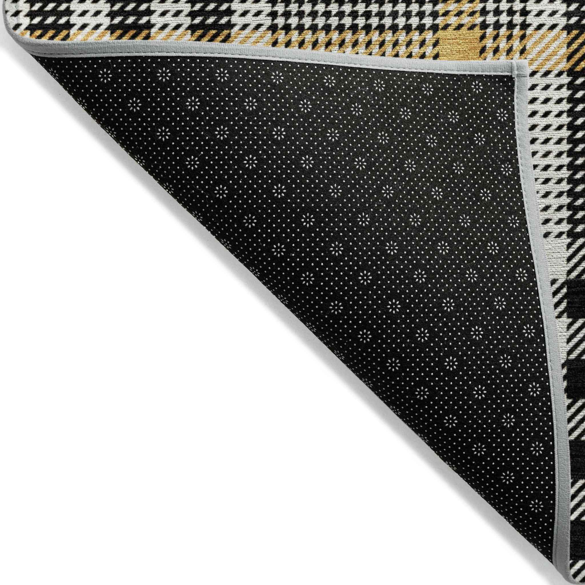 5' X 8' Black Gold And Ivory Plaid Washable Indoor Outdoor Area Rug