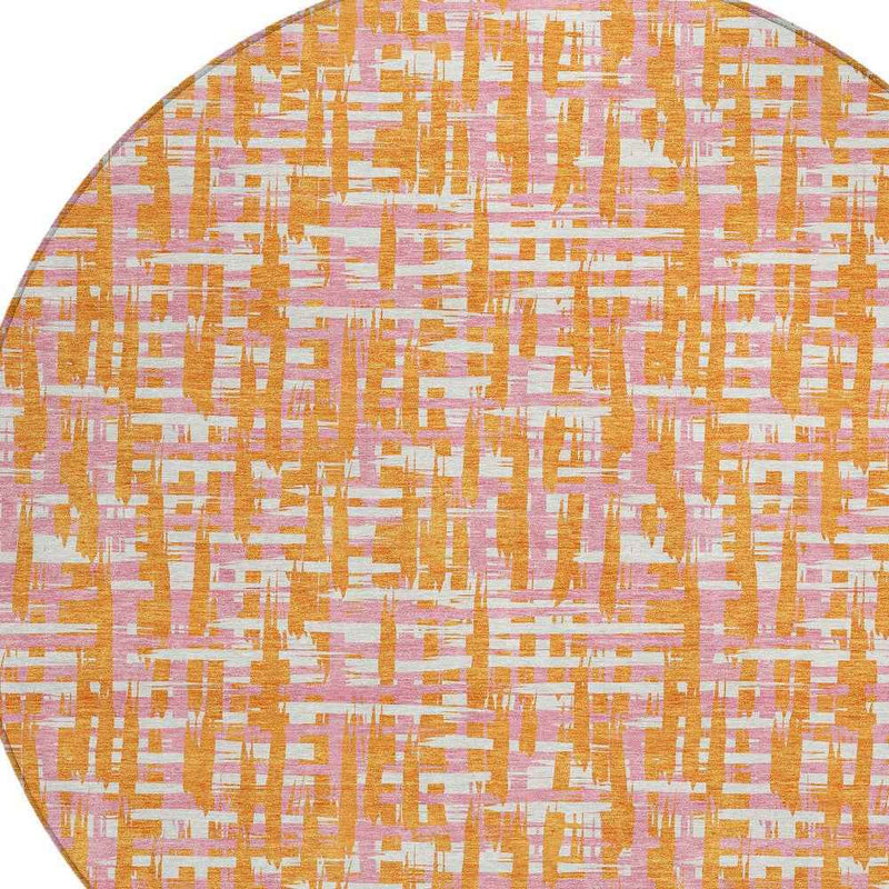 8' Orange Pink And Beige Round Abstract Washable Indoor Outdoor Area Rug