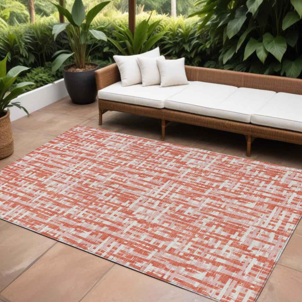 10' X 14' Coral Pink And Ivory Abstract Washable Indoor Outdoor Area Rug