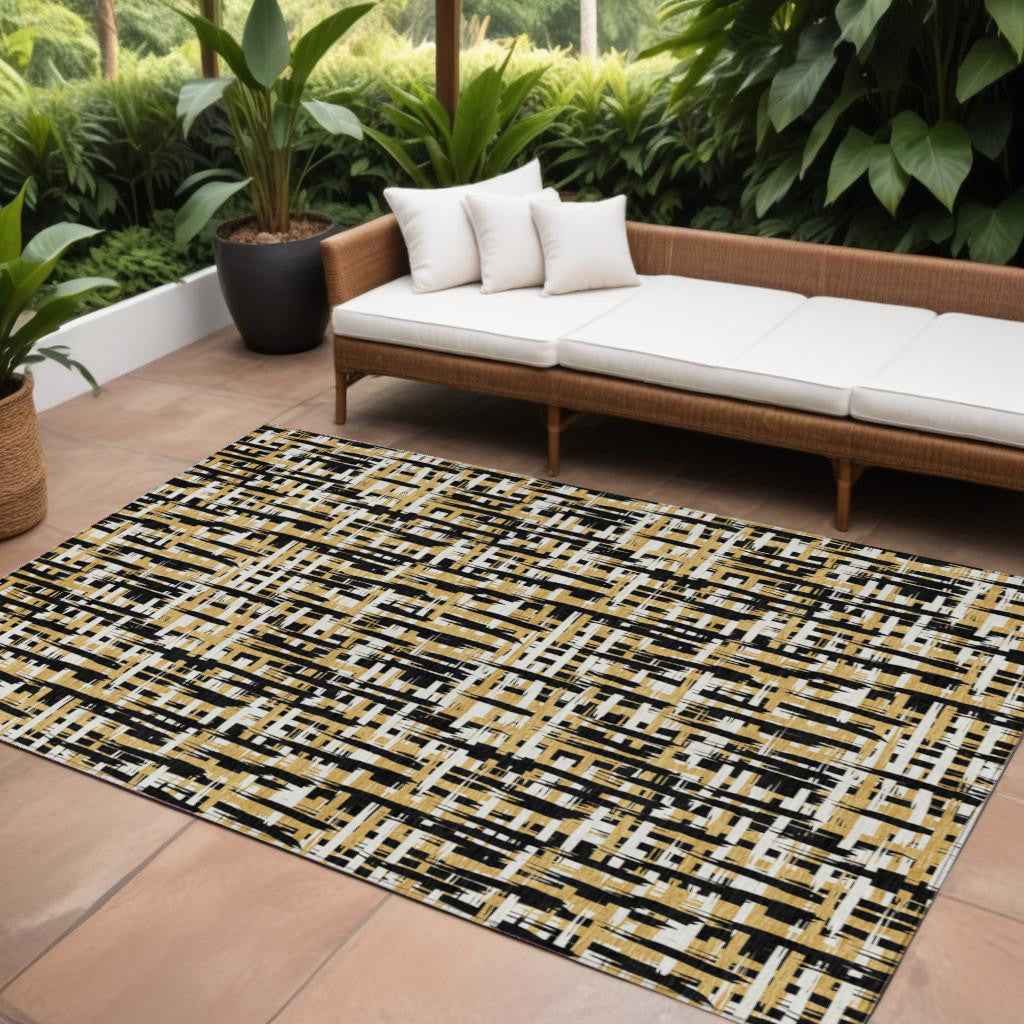 9' X 12' Black Gold And Ivory Abstract Washable Indoor Outdoor Area Rug