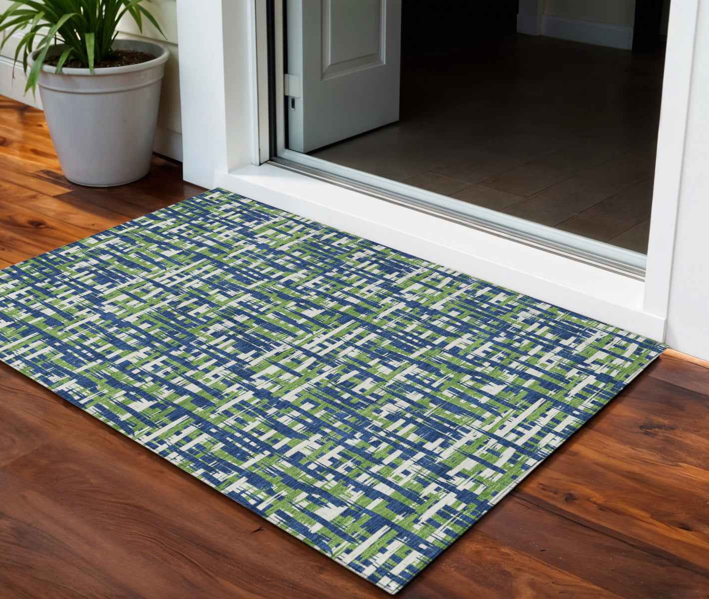 3' X 5' Navy Blue Green And Ivory Abstract Washable Indoor Outdoor Area Rug