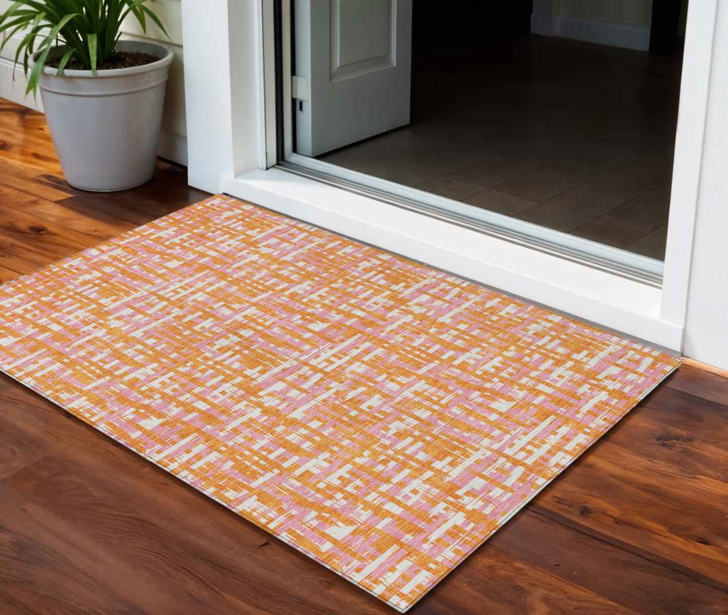 3' X 5' Orange Pink And Beige Abstract Washable Indoor Outdoor Area Rug