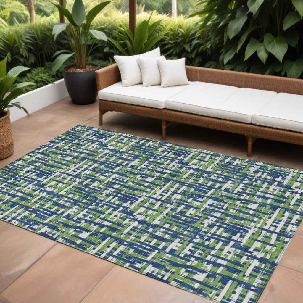 9' X 12' Navy Blue Green And Ivory Abstract Washable Indoor Outdoor Area Rug