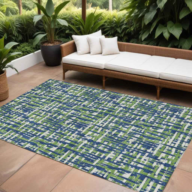 9' X 12' Navy Blue Green And Ivory Abstract Washable Indoor Outdoor Area Rug