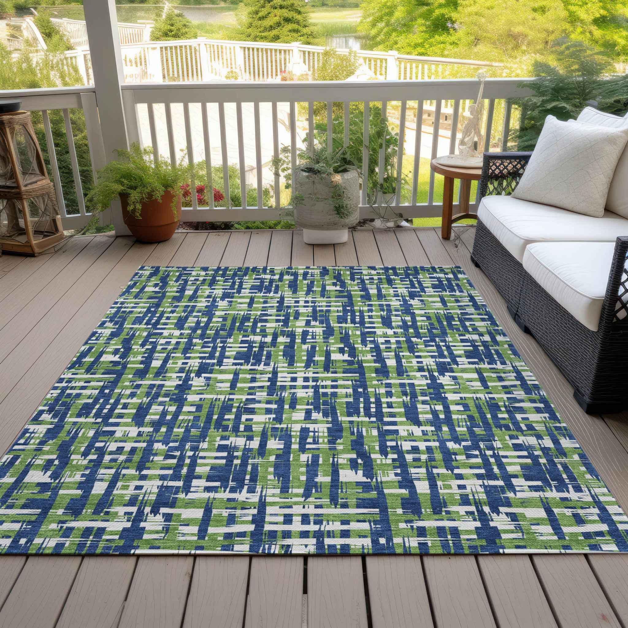 5' X 8' Navy Blue Green And Ivory Abstract Washable Indoor Outdoor Area Rug