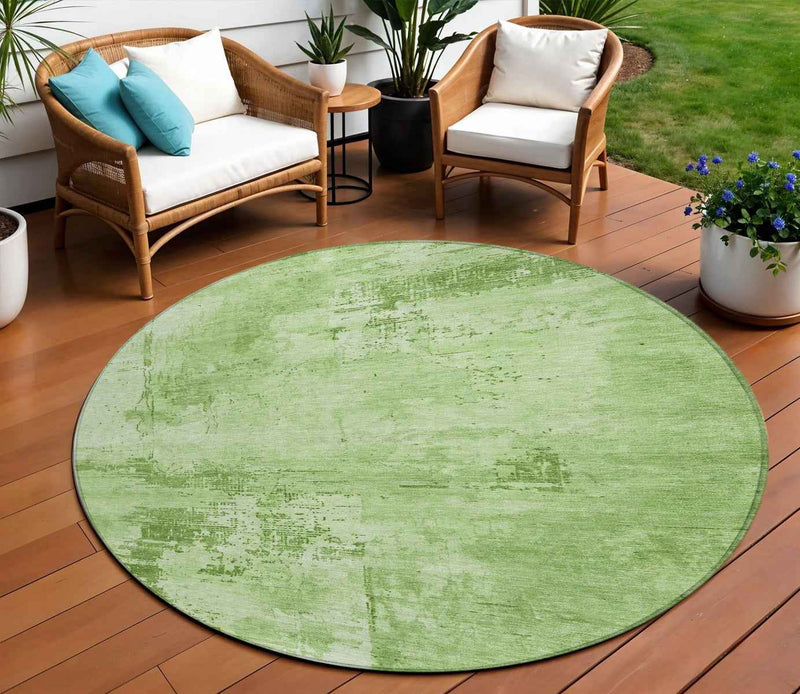 8' Green And Ivory Round Abstract Washable Indoor Outdoor Area Rug