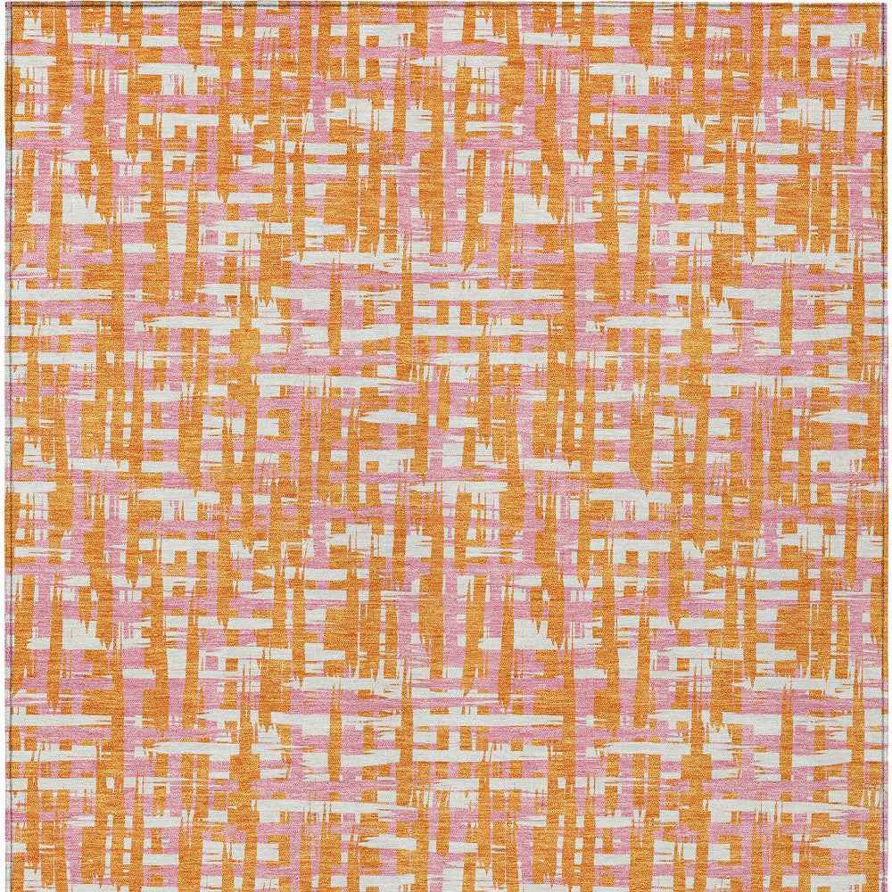 5' X 8' Orange Pink And Beige Abstract Washable Indoor Outdoor Area Rug