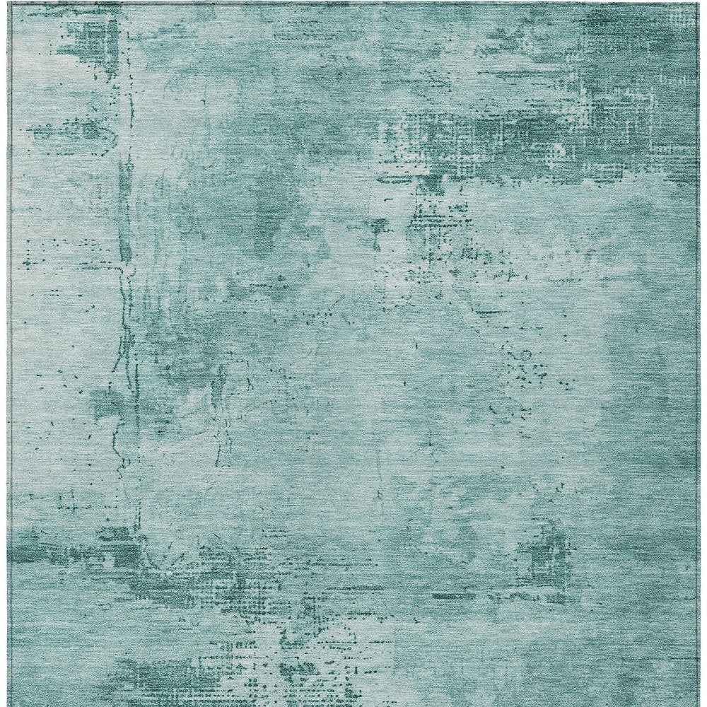 9' X 12' Teal Blue And Ivory Abstract Washable Indoor Outdoor Area Rug