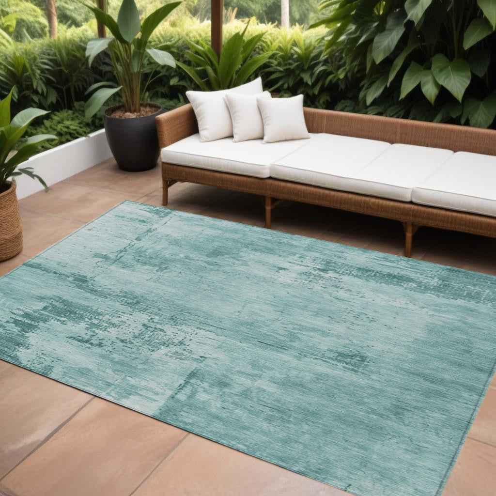 8' X 10' Teal Blue And Ivory Abstract Washable Indoor Outdoor Area Rug