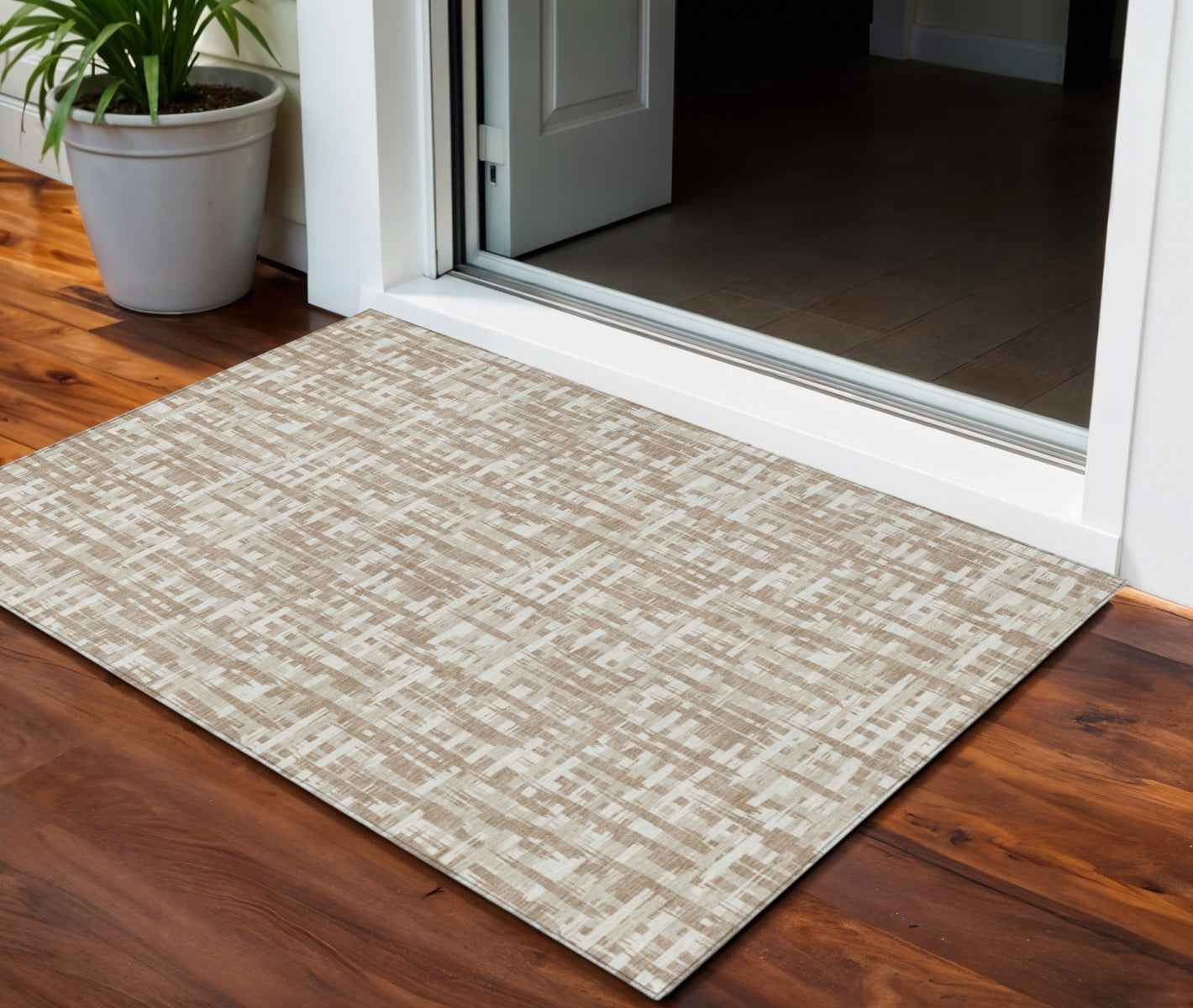 3' X 5' Tan And Beige Abstract Washable Indoor Outdoor Area Rug
