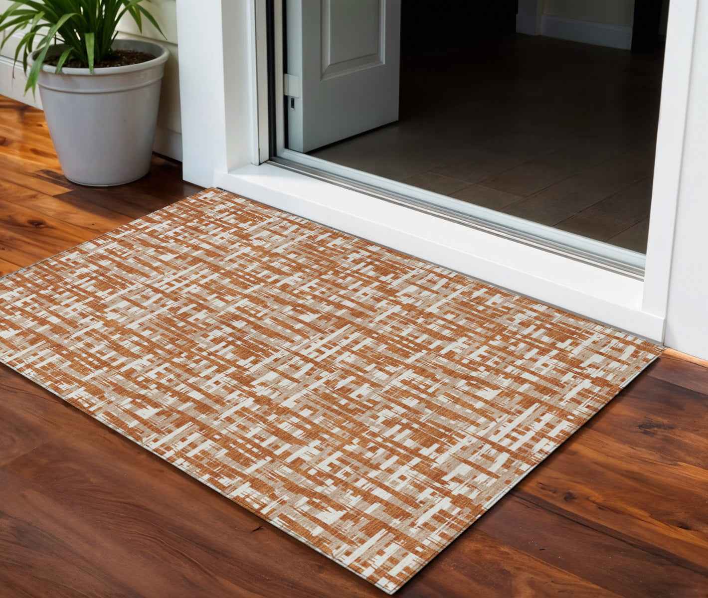 3' X 5' Terra Cotta Tan And Ivory Abstract Washable Indoor Outdoor Area Rug