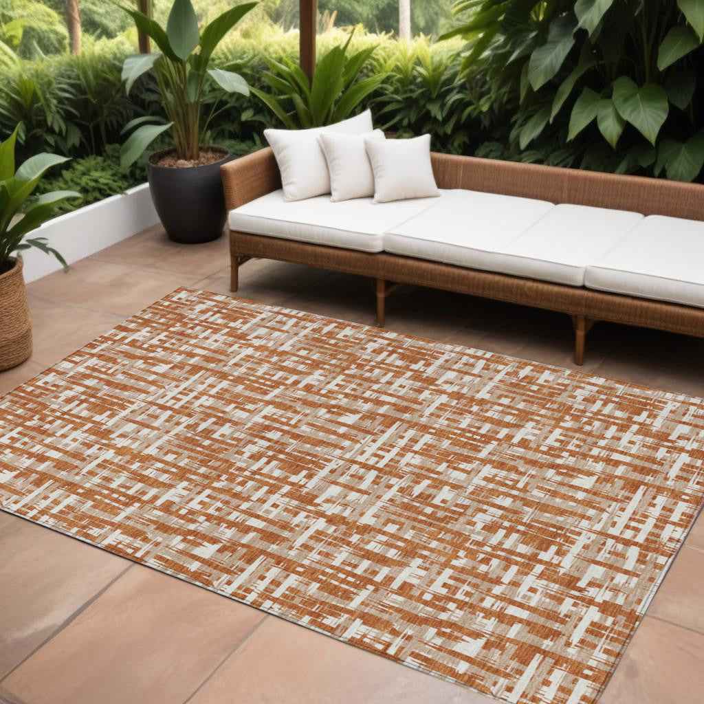 9' X 12' Terra Cotta Tan And Ivory Abstract Washable Indoor Outdoor Area Rug