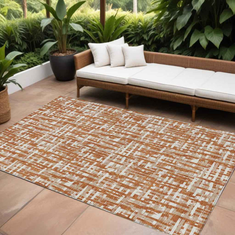 9' X 12' Terra Cotta Tan And Ivory Abstract Washable Indoor Outdoor Area Rug